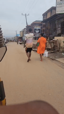 Street traffic and pedestrians observed in Onitsha, Nigeria