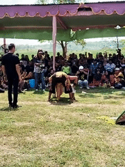 Outdoor performance event with fire stunts draws crowd in Karanganom