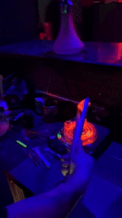 Late night bar scene with DJ and hookah preparation in Varna