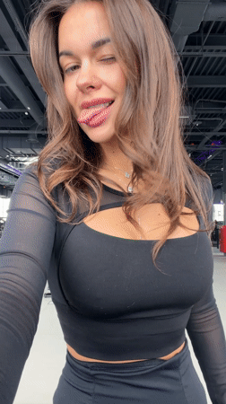 Young woman photographed at gym, elevator in Krasnoyarsk