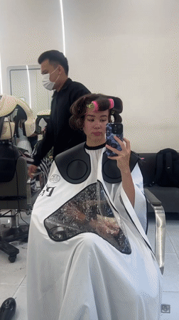 Woman gets hair styled at Nha Trang salon