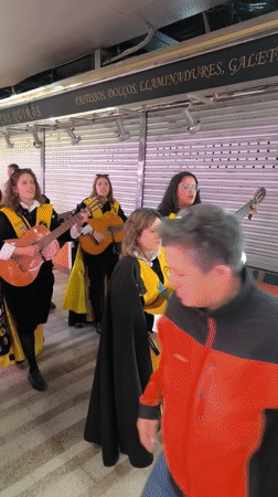 Musical troupe performs in fish market in Ripollet, Spain