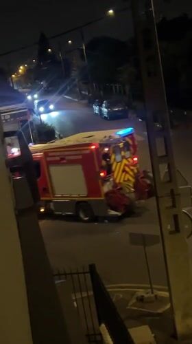 Friday night streets in Montfermeil: emergency response, foot traffic, fast car