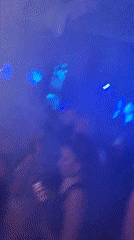 Nightclub patrons dance, smoke hookah in Dobrich Bulgaria venue