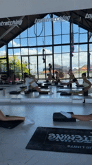 Women attend stretching class at Topstretching studio in Dalung