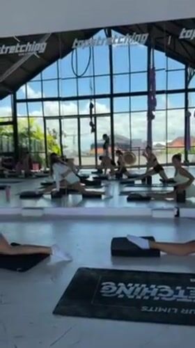 Women attend stretching class at Topstretching studio in Dalung