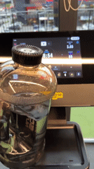 Water bottle on a treadmill tray, Sofia gym