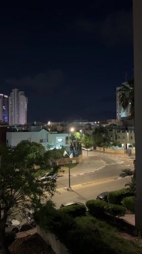 Nighttime street scene captured in Netanya, Israel