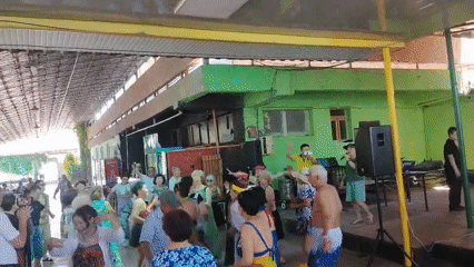Morning dance party at an outdoor venue in Tuyabuguz