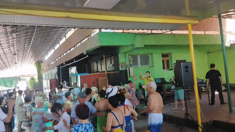 Morning dance party at an outdoor venue in Tuyabuguz