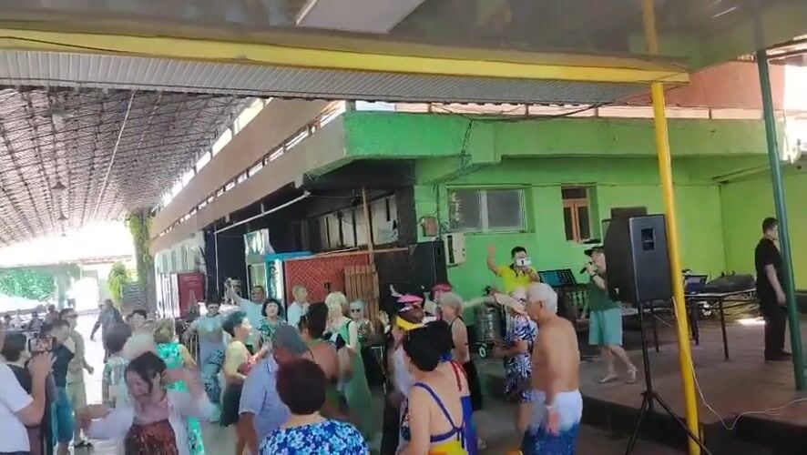Morning dance party at an outdoor venue in Tuyabuguz