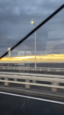 Evening bridge crossing captured on video in Yokohama