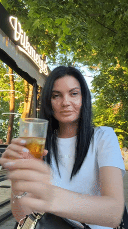 Live music, drinks, and pizza at a Vilnius outdoor venue