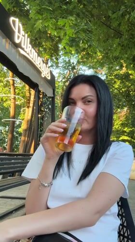 Live music, drinks, and pizza at a Vilnius outdoor venue