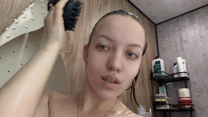 Woman's morning shower routine captured in Reshetnikovo, Russia