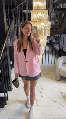Woman Takes Selfie in Ornate Moscow Building Hallway