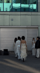 Group gathers outside striped-door building in Bishkek