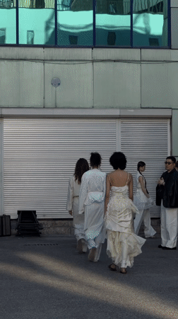 Group gathers outside striped-door building in Bishkek