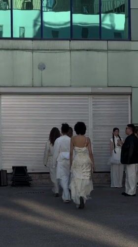 Group gathers outside striped-door building in Bishkek