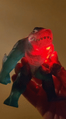 Illuminated toy creatures documented in separate indoor locations