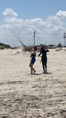 Two women with kitesurfing gear spotted on Acre beach