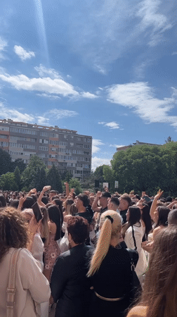 Graduation ceremony held in outdoor courtyard in Blagoevgrad, Bulgaria