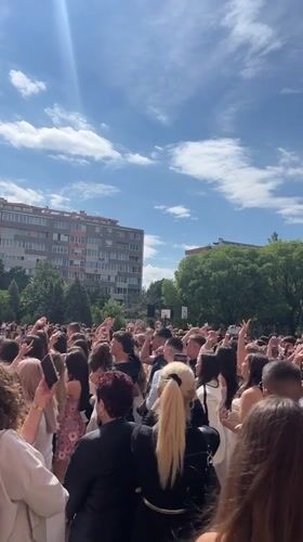 Graduation ceremony held in outdoor courtyard in Blagoevgrad, Bulgaria