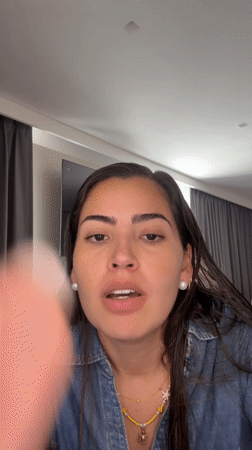Woman films makeup tutorial at home in Mexico