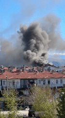 Family life continues in Fethiye amid smoke plume