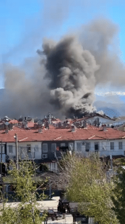 Family life continues in Fethiye amid smoke plume