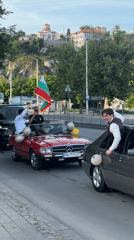 Festive car parade with Bulgarian flags celebrates in Plovdiv