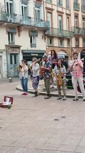 Street band performs at Goudouli fountain in Toulouse