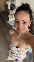 Woman Takes Morning Selfies in Floral Dress in Kazan