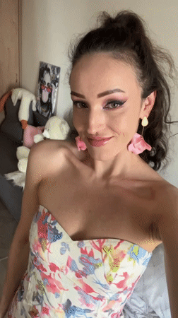 Woman Takes Morning Selfies in Floral Dress in Kazan