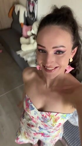 Woman Takes Morning Selfies in Floral Dress in Kazan