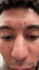 Close-up video captures person looking down in London