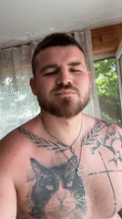 Man takes shirtless selfie indoors in Sliven, Bulgaria