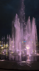 Colorful illuminated fountain display draws evening crowds in Perm