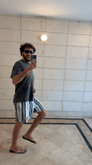 Tel Aviv afternoon: beach crowds, a mirror pose, and a watermelon run