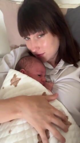 New mother and baby documented in quiet morning moments