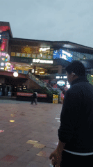 Pedestrians gather in Chongqing High-tech Zone commercial plaza