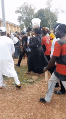 Women gather outside Hall 5 in Akwanga, Nigeria
