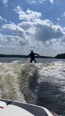 Wakeboarder enjoys sunny morning on Russian lake