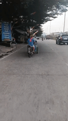 Morning traffic and electric buses on Jakarta's streets