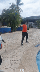 Resort guests participate in poolside fitness routine in Venezuela