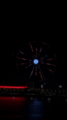 Lusail City Ferris wheel illuminates Qatar waterfront in evening display