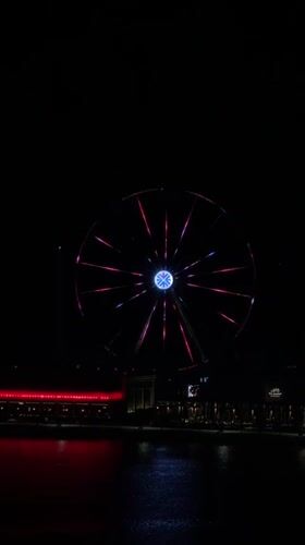 Lusail City Ferris wheel illuminates Qatar waterfront in evening display