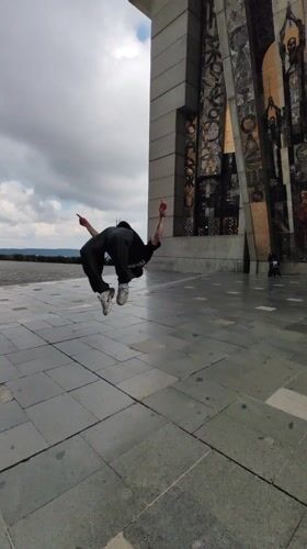 Man stands atop Bulgaria's 1300 Years Monument in Shumen