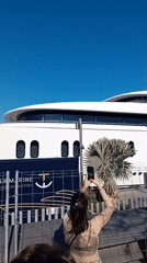 Luxury superyachts spotted at Barcelona marina on sunny afternoon