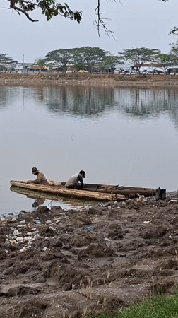 Quiet morning along the muddy waterfront in Lhokseumawe